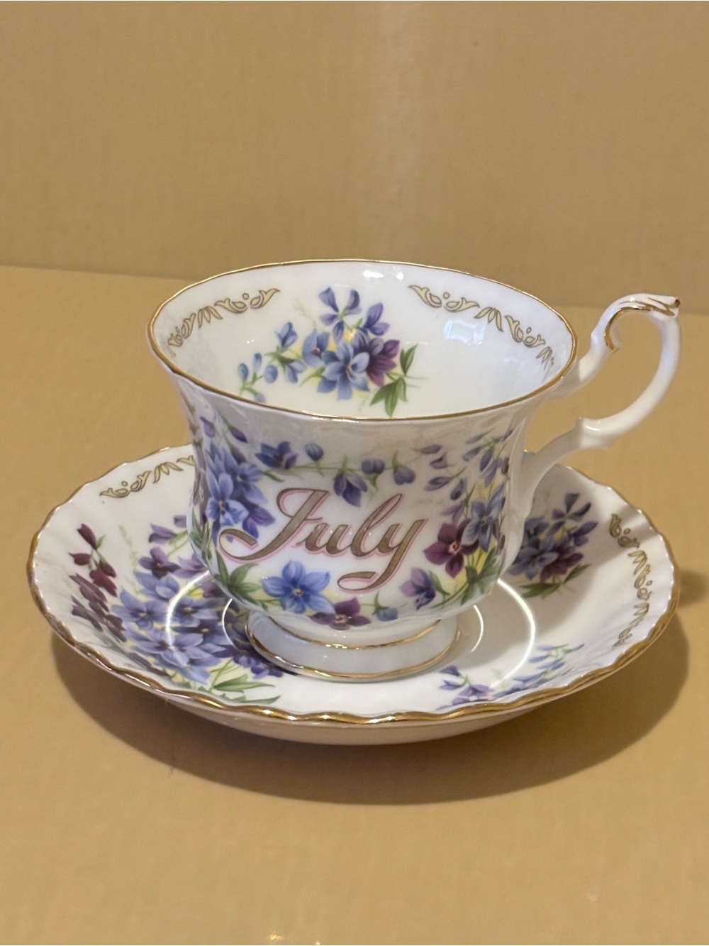 July” Floral Bone China  Teacup and Saucer by Golden Crown